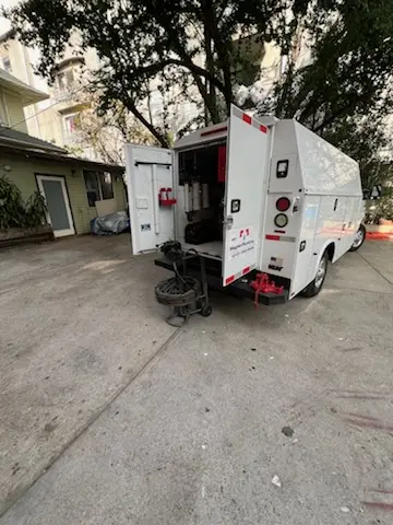 Magnet Plumbing service vehicle on-site for Water Heater Repair in Panama City Beach
